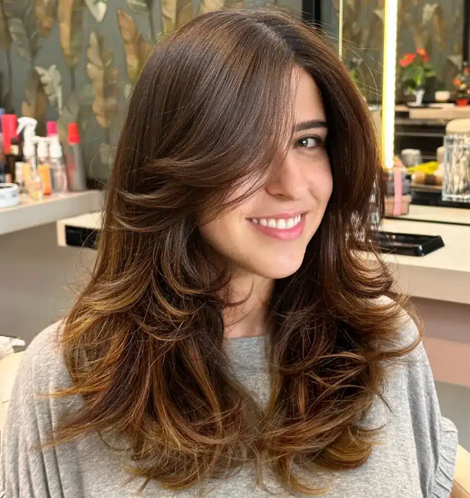 corte de cabelo ondulado feminino médio 2026