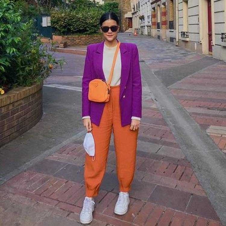 Como combinar laranja e roxo em looks ousados