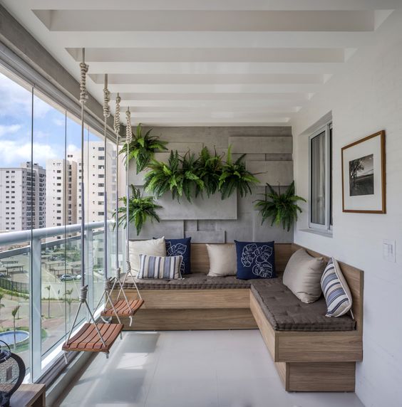 Como decorar varanda fechada com cortina de vidro