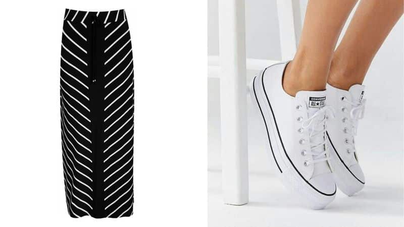 look de trabalho com saia midi e tênis