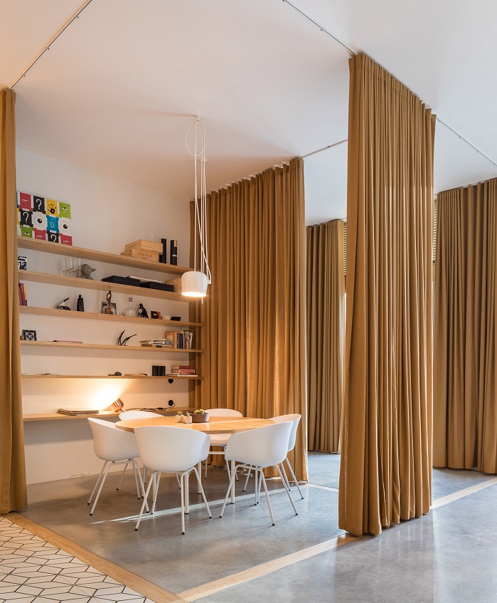 Como usar telas decorativas para dividir ambientes