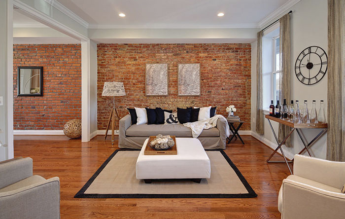 Inspirações: 5 estilos de sala com tijolinho aparente para você amar