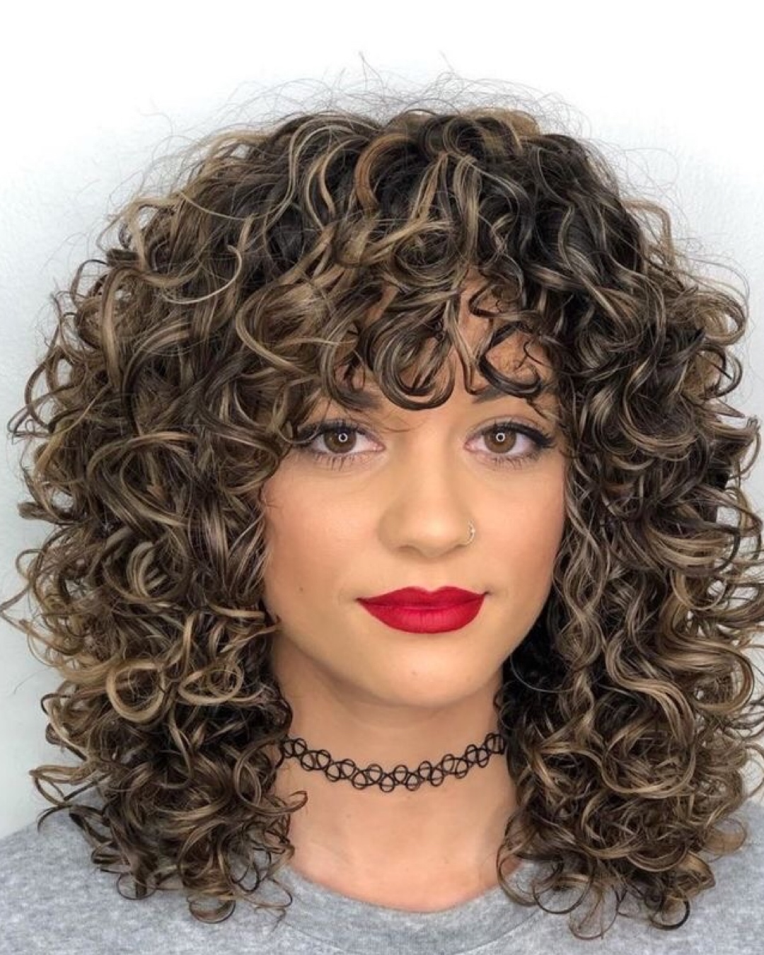 franja para cabelo ondulado em camadas