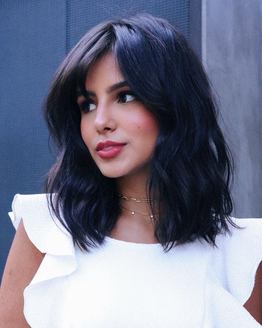corte long bob cacheado com franja