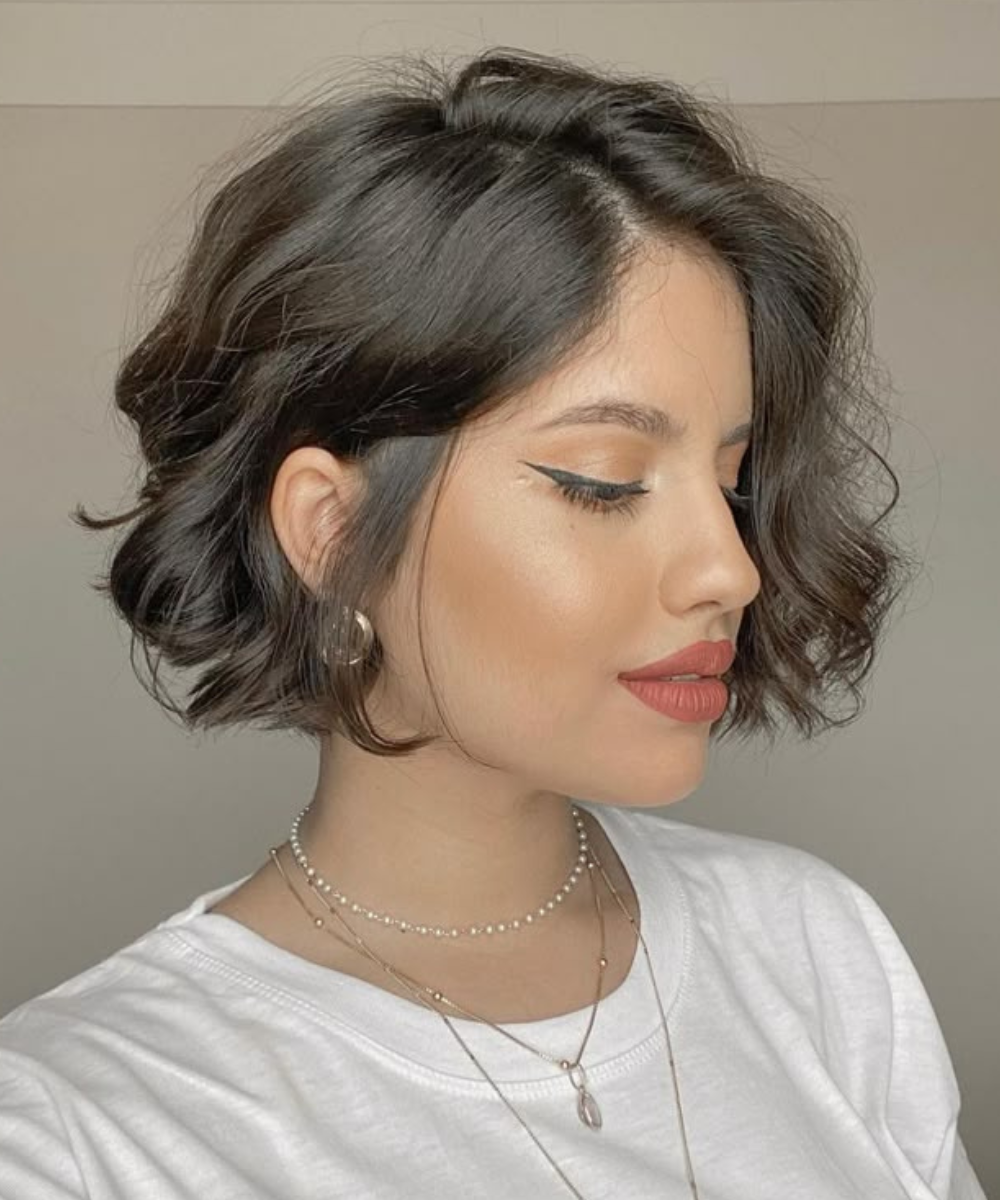 corte medio cabelo ondulado feminino