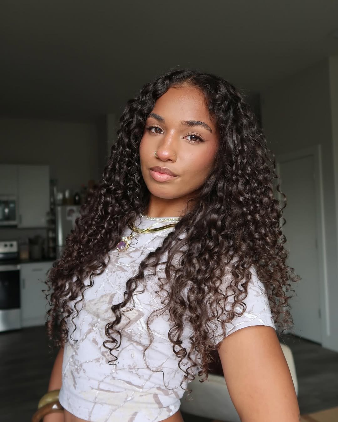 corte em U para cabelo cacheado longo