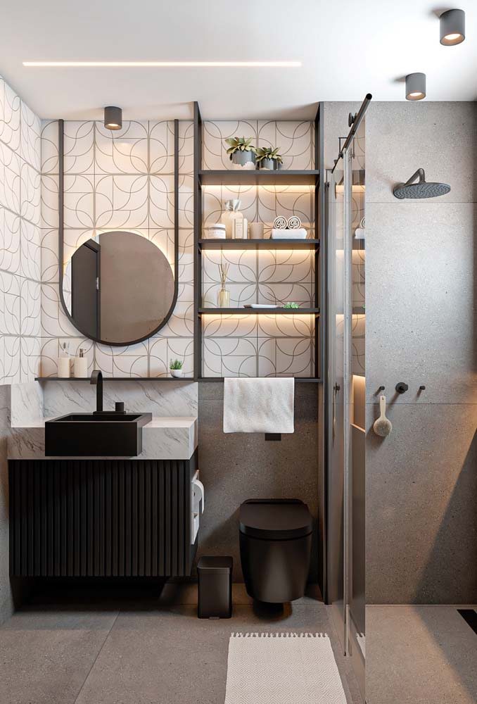 banheiro preto e branco com louças brancas