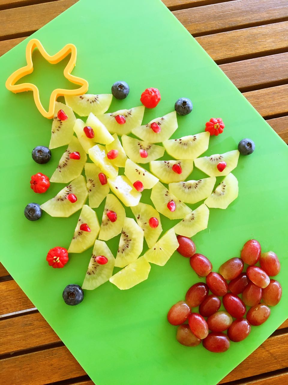 decoração de natal com frutas e legumes