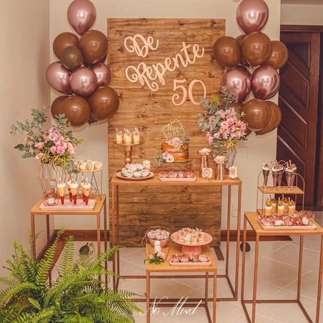 decoração 50 anos feminina dourado e preto