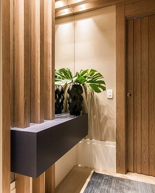 hall de entrada com espelho apartamento