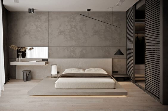 quarto minimalista com quadros