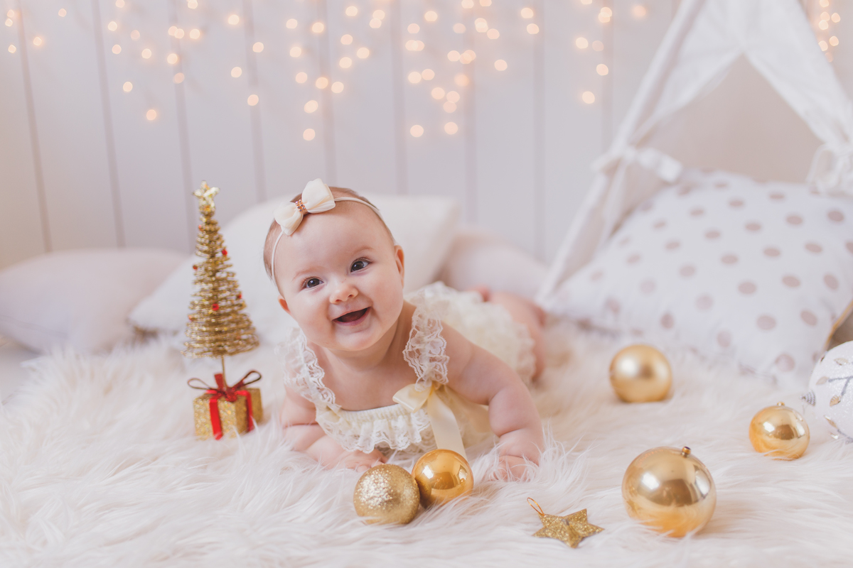 Guia Completo de Poses e Dicas de Iluminação para Fotos de Natal Newborn