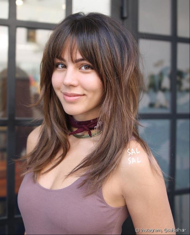 franja desfiada cabelo longo