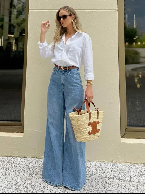 calça jeans pantalona preta cintura alta