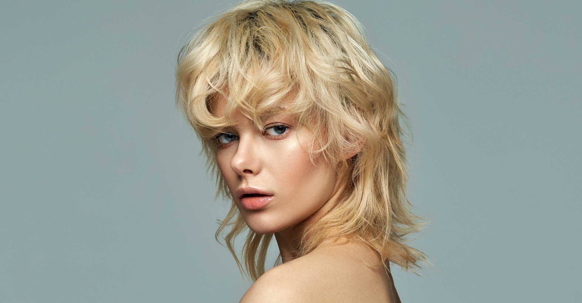 mullet com franja cabelo ondulado
