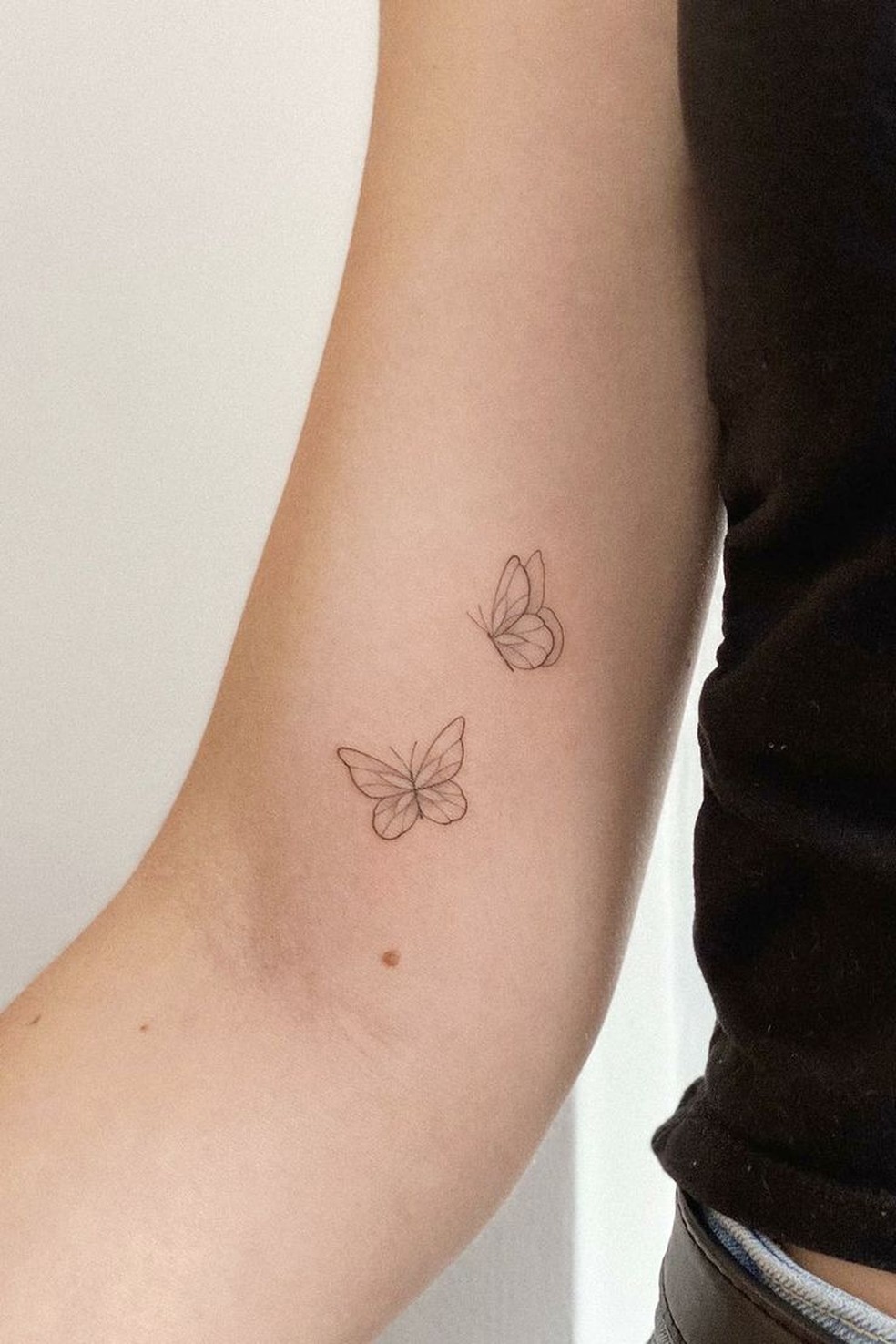 tatuagem borboleta no pulso