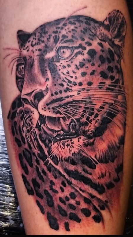 tatuagem onça liderança