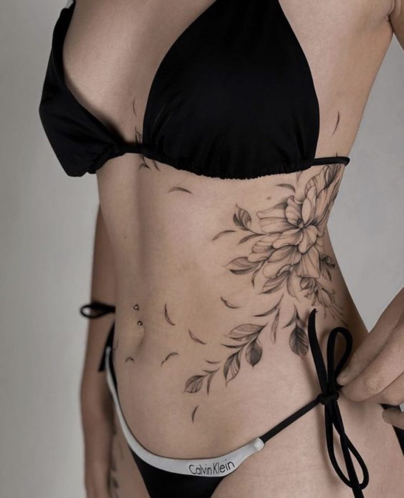tatuagem feminina barriga mandala