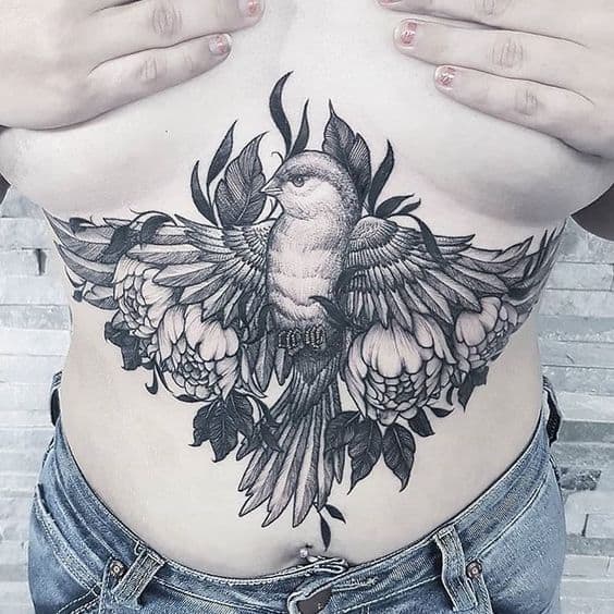 tatuagem feminina barriga desenho vertical