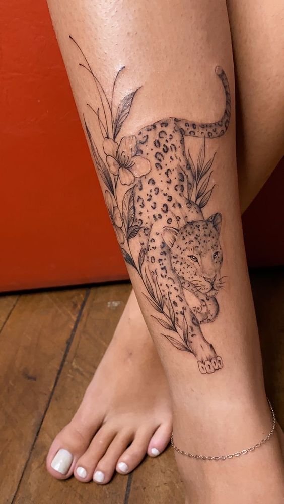 tatuagem escrita canela feminina