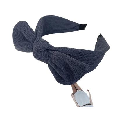 Tendência de acessórios de cabelo com laços gigantes