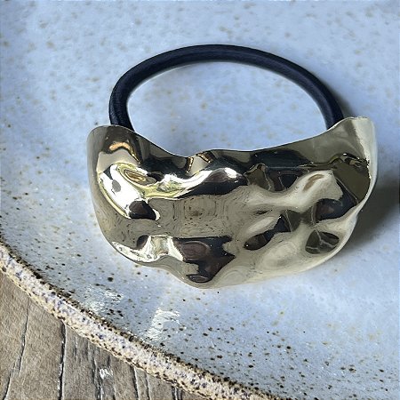 acessórios com textura martelada 2025