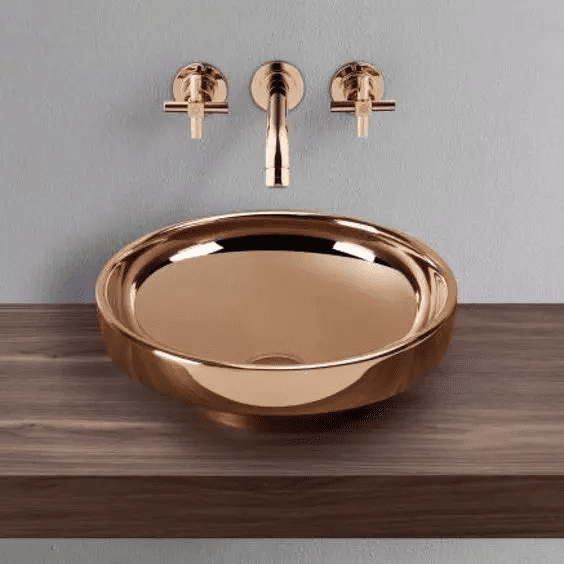 Tendência de metais rose gold para banheiros femininos