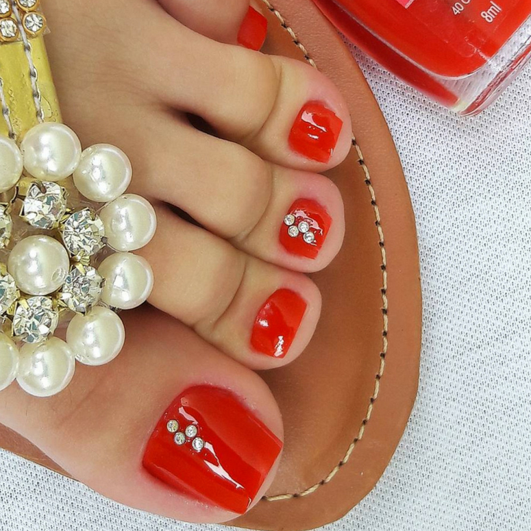 unha vermelha pé o que pode ser