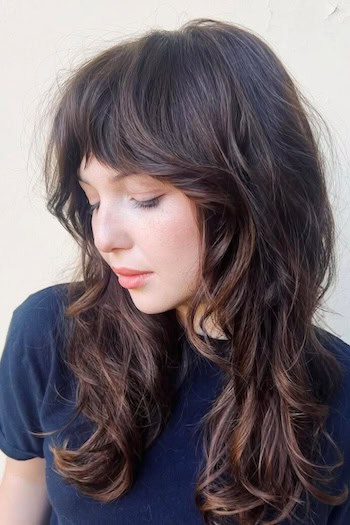 wolf cut cabelo ondulado longo