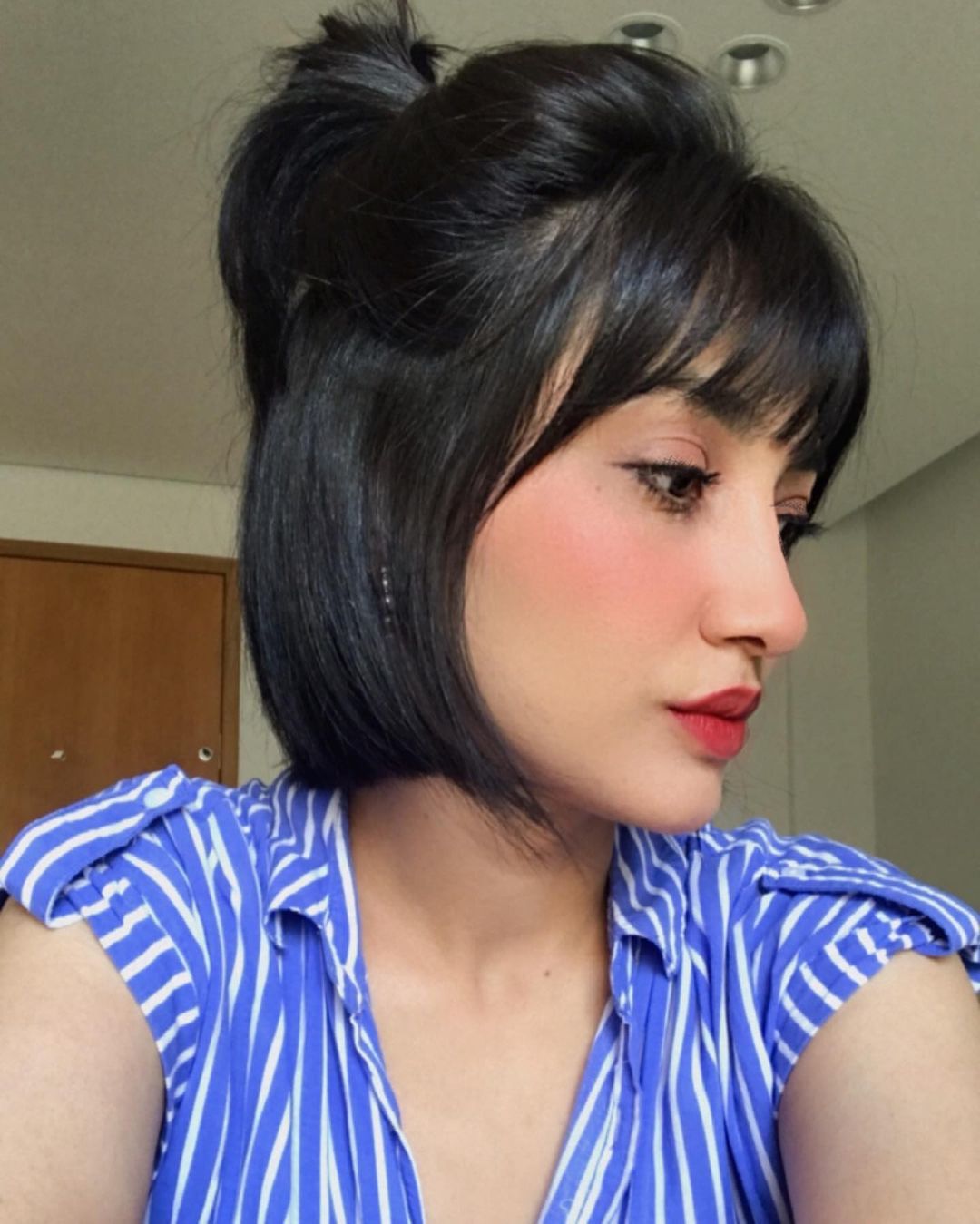 cabelo médio com franja desfiada