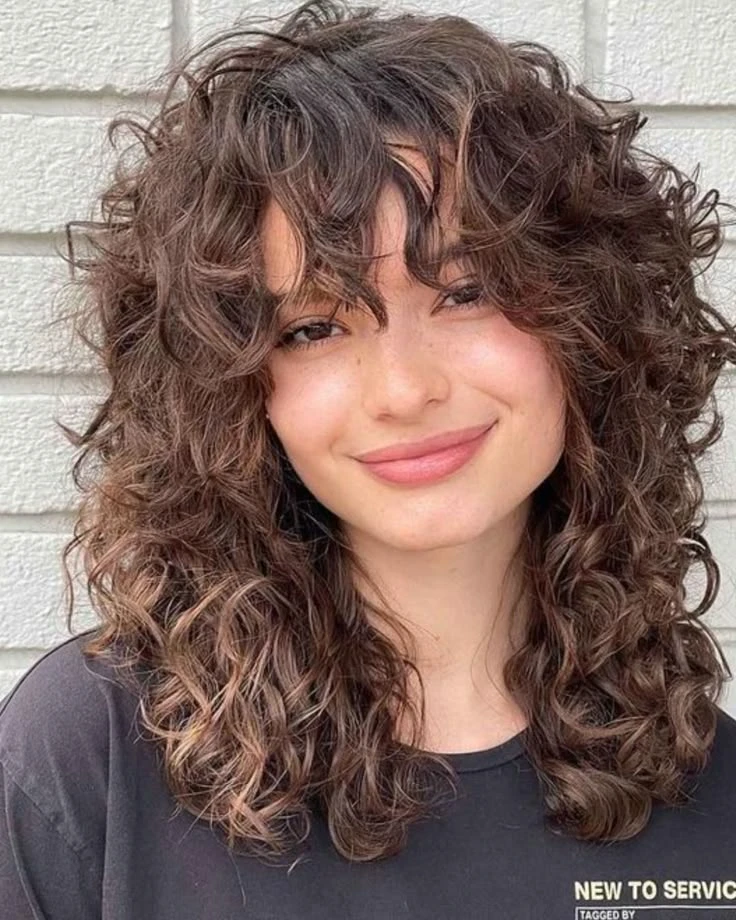 corte para dar volume cabelo ondulado