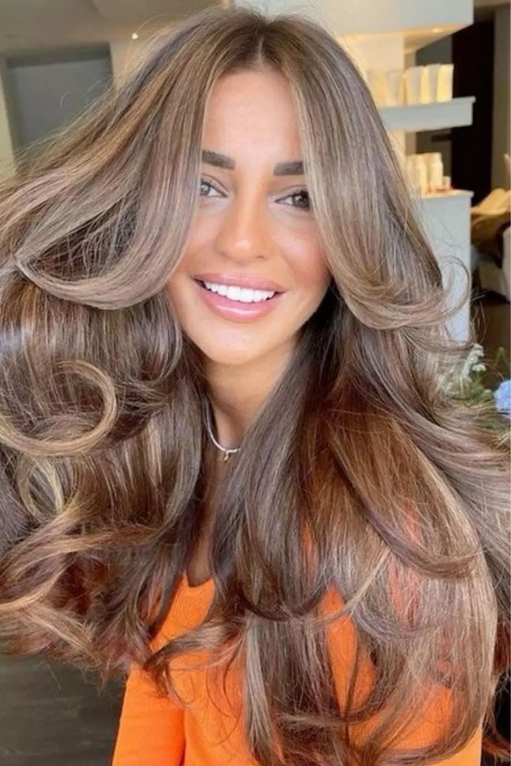 corte de cabelo longo com movimento