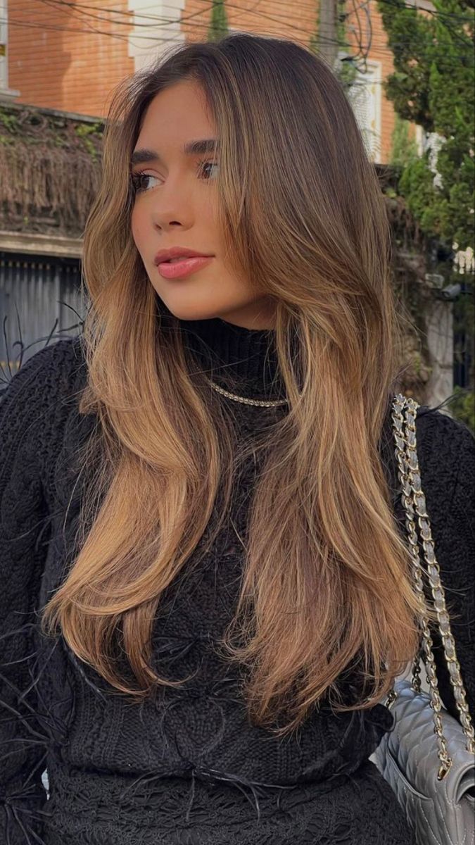 corte de cabelo longo com movimento