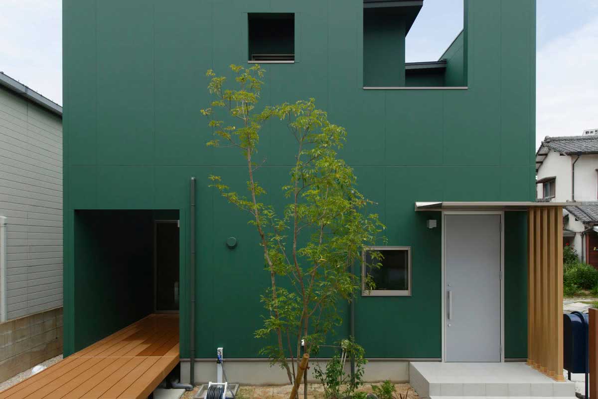 fachada casa verde menta