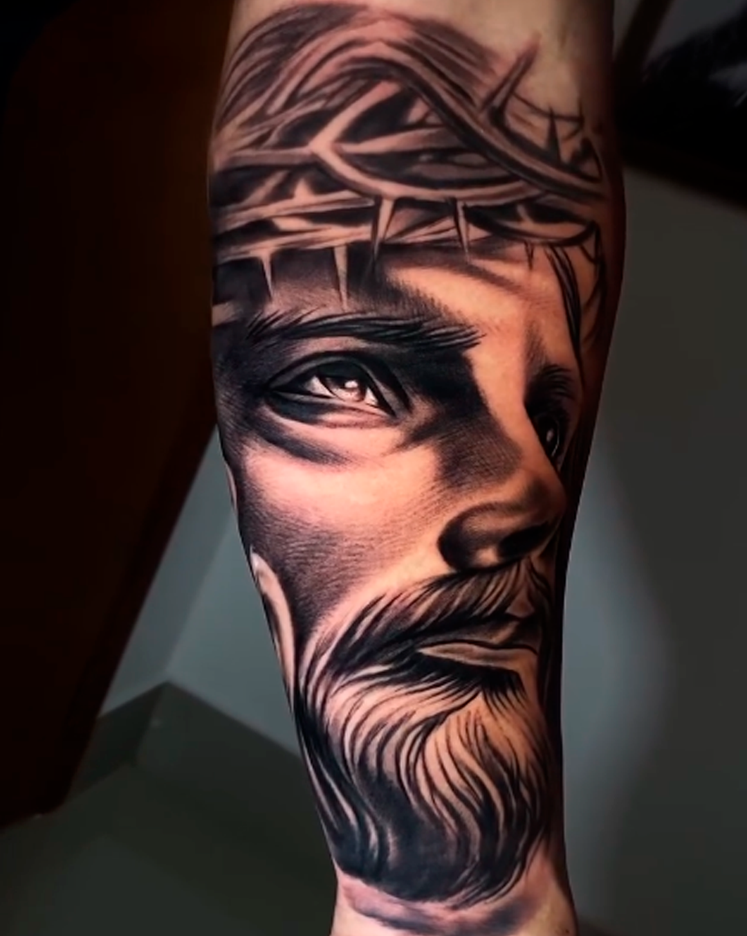 tatuagem de Jesus estilo realismo