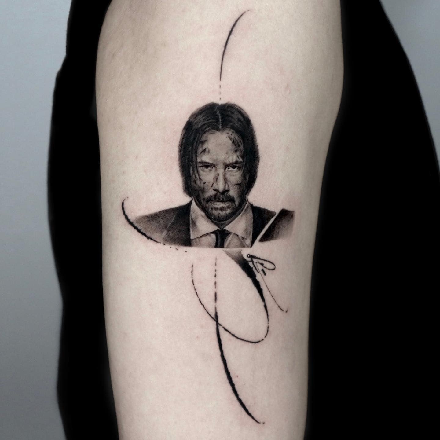 significado tatuagem john wick
