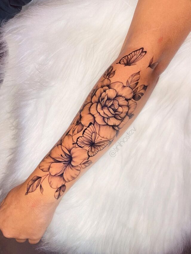 tatuagem floral braço feminina