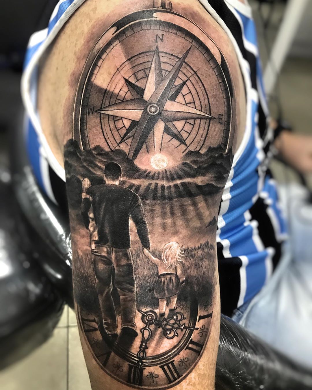 tatuagem de casal com filhos