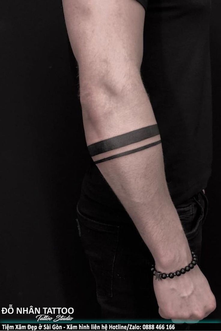 significado tatuagem faixa preta braço