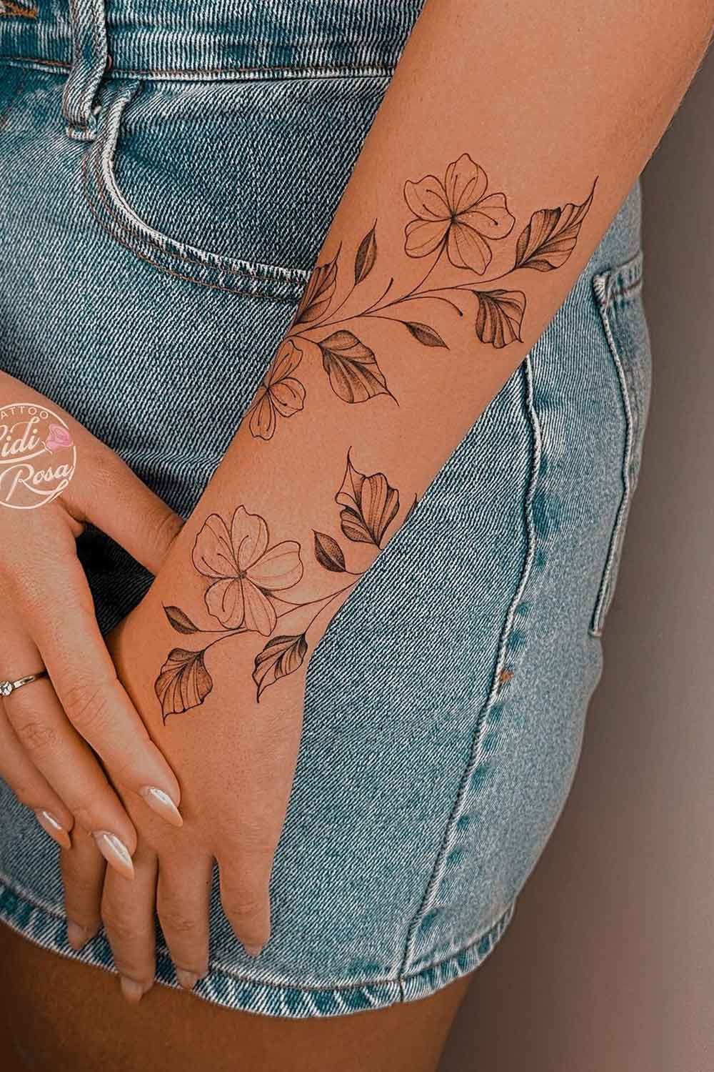 tatuagem feminina braço pequena
