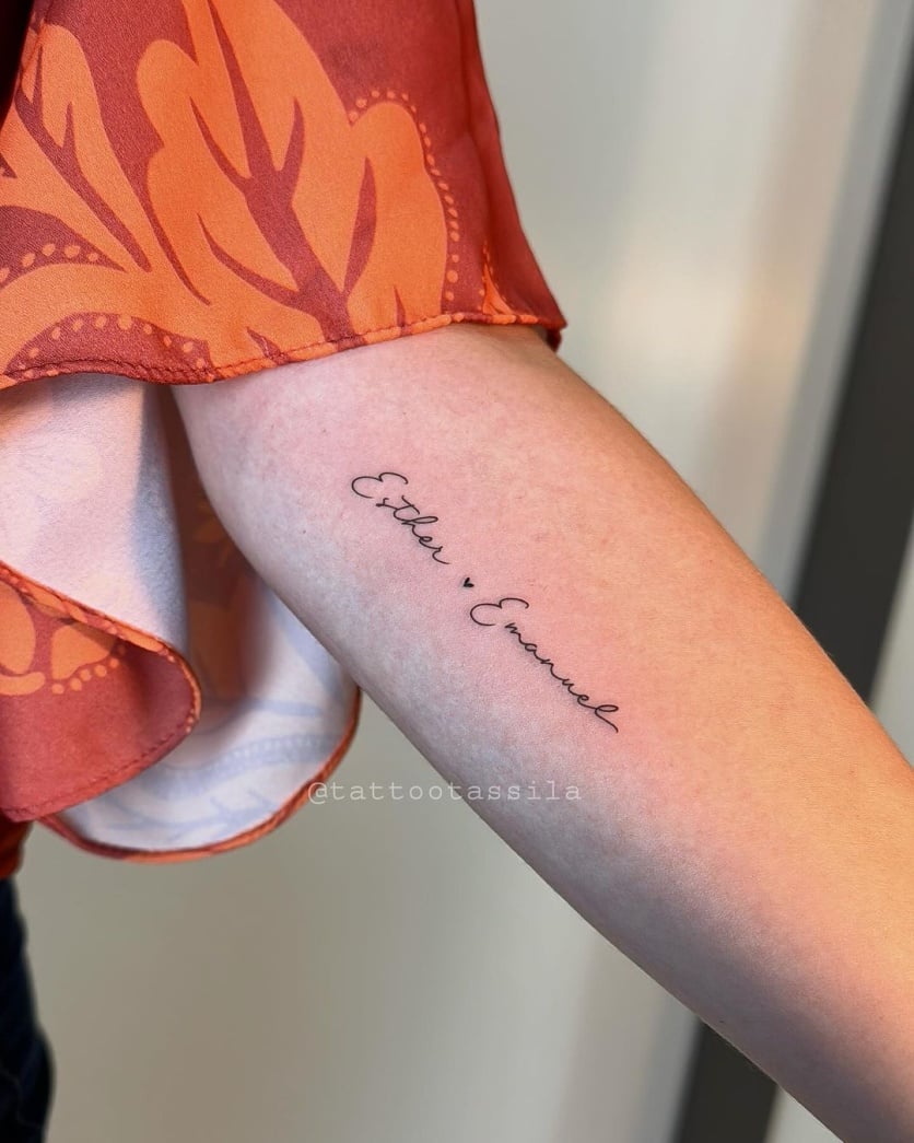 tatuagem nome filho pulso