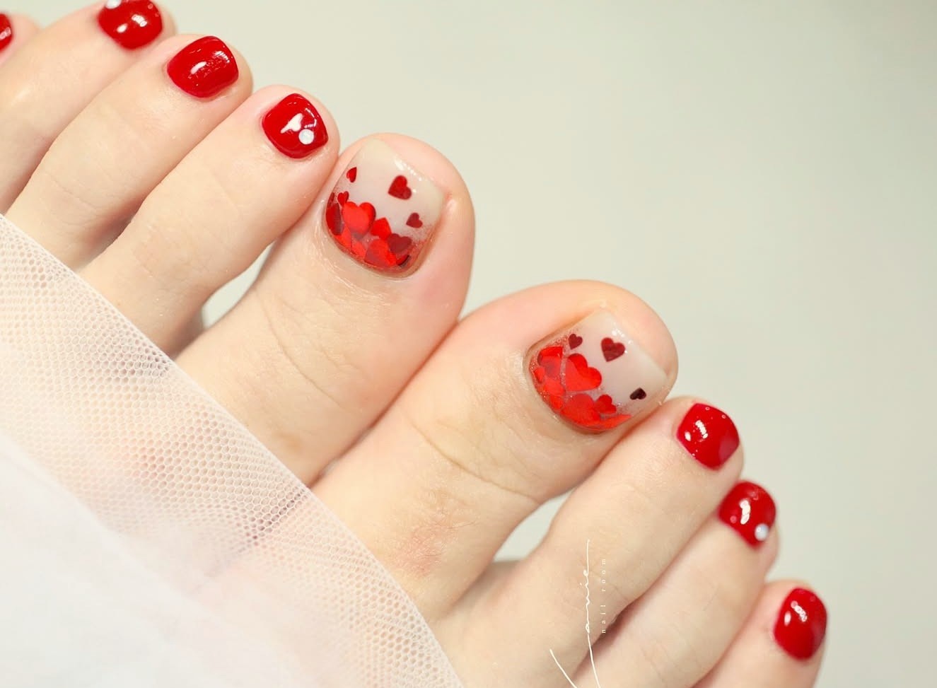 unha do pé com sangue embaixo