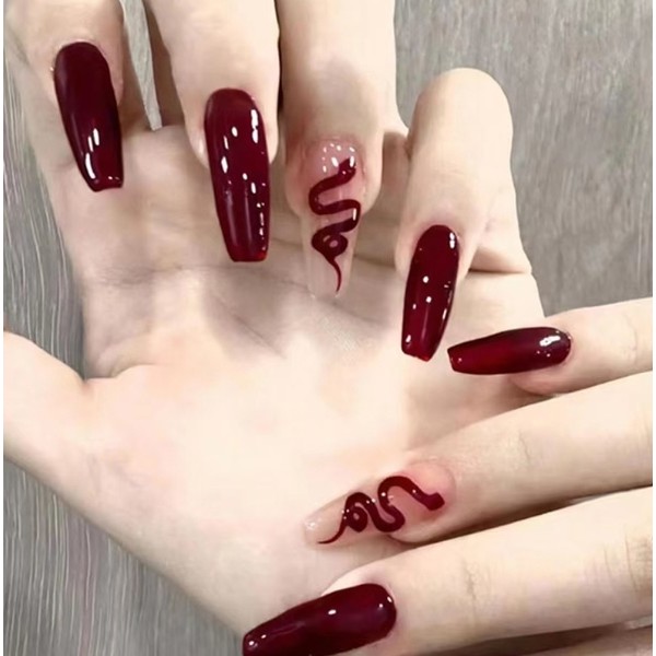 unha stiletto vinho com pedraria