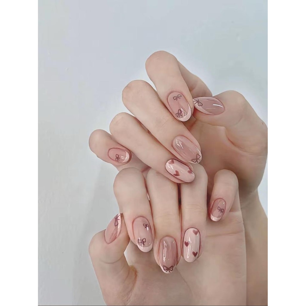 Unhas em gel rosa nude